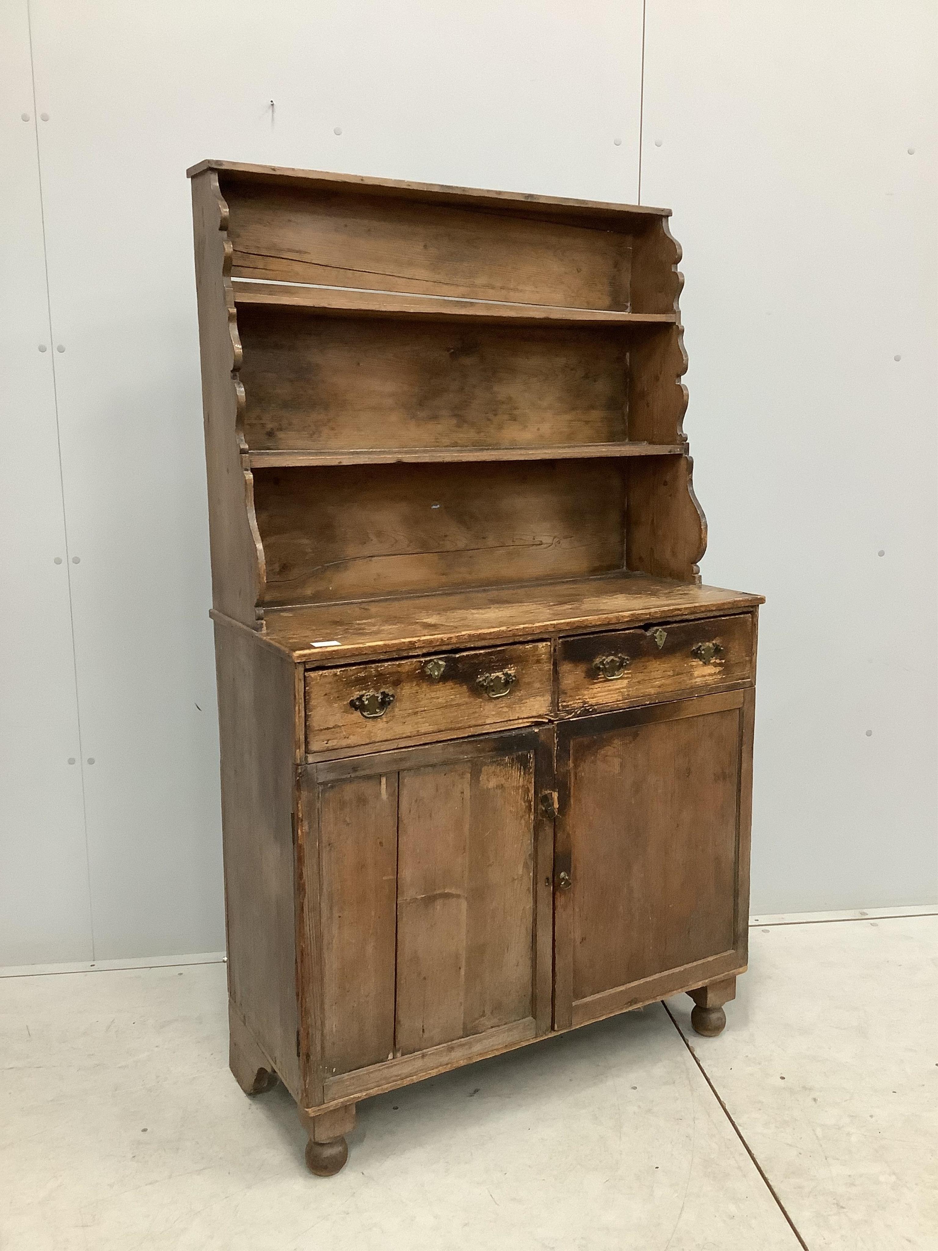 A 19th century Provincial stripped pine Welsh dresser, width 92cm, depth 41cm, height 160cm. Condition - poor